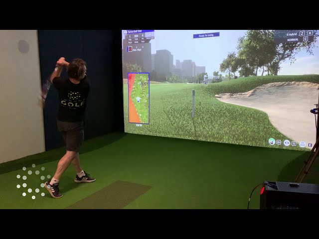 This is golf simulator installation hidden in the back shop of a warehouse!