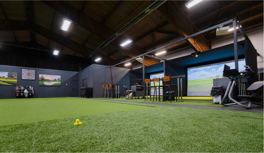 Commercial Golf Simulator Enclosure with large putting green in center
