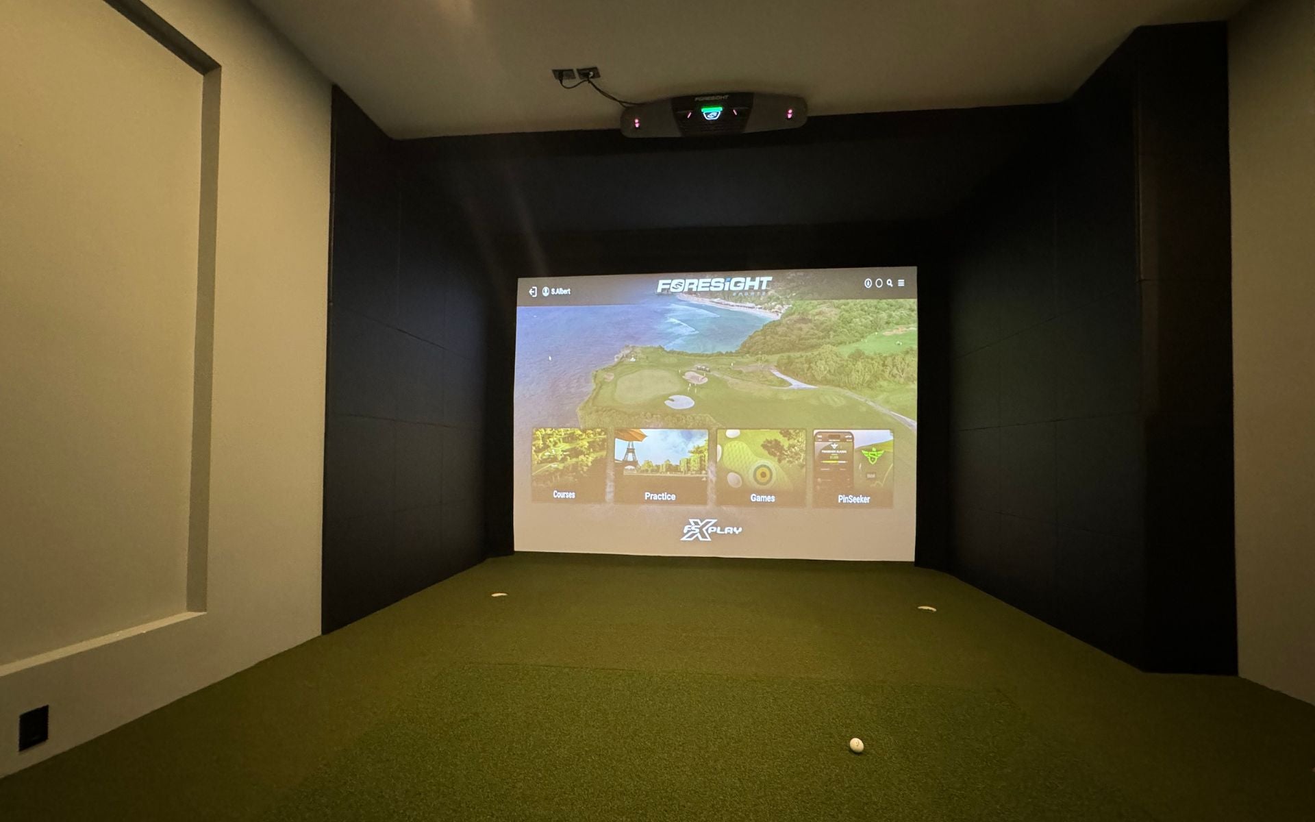 Home golf simulator with foresight falcon launch monitor