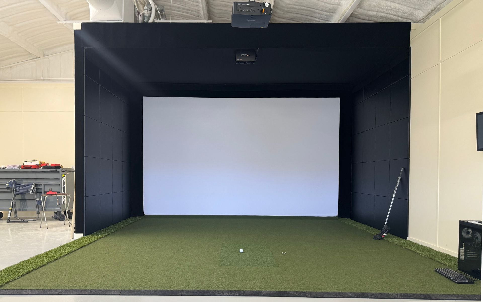 Home golf simulator with benq projector and IDRA launch monitor