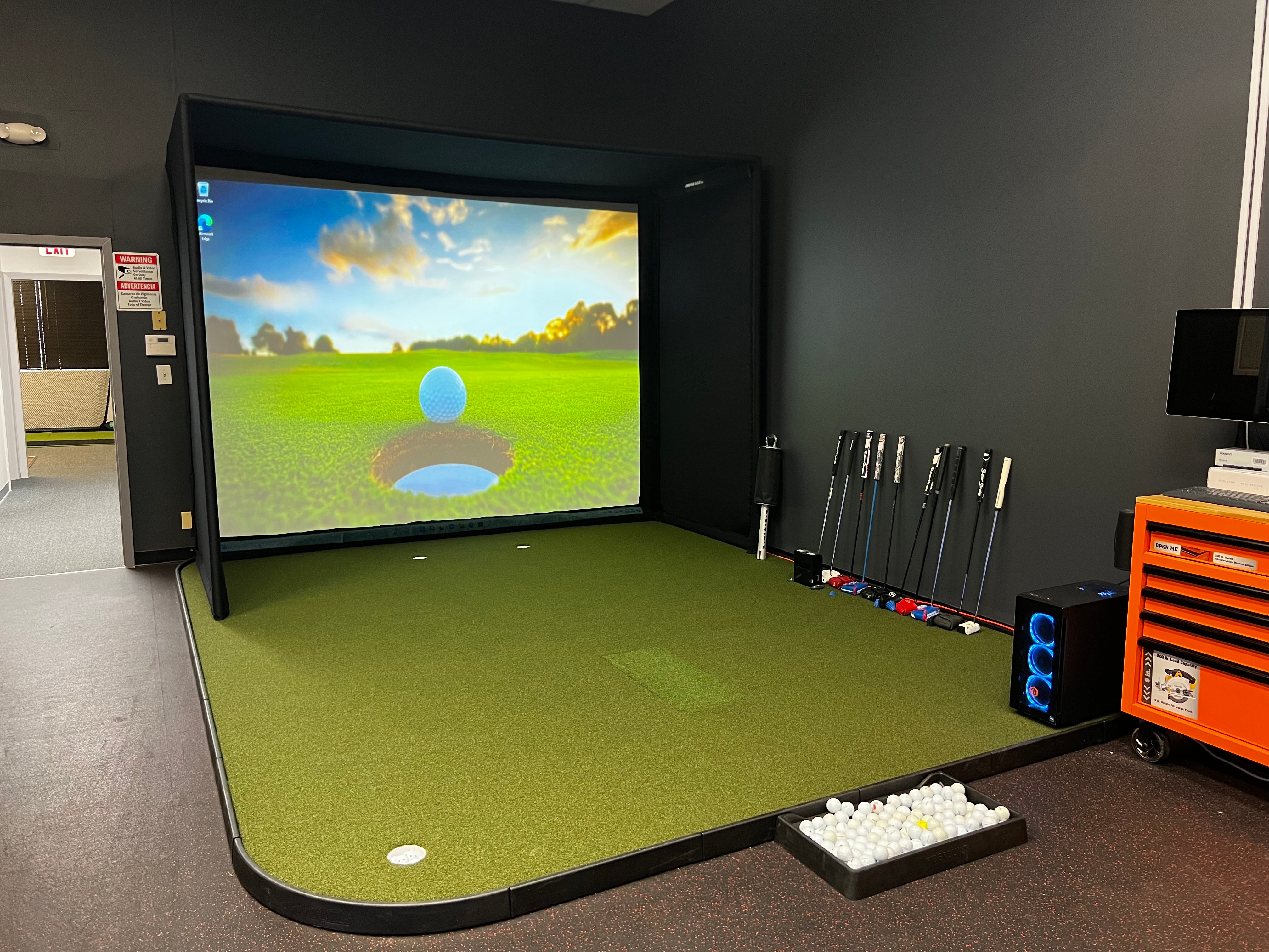 The indoor golf shop studio with flooring