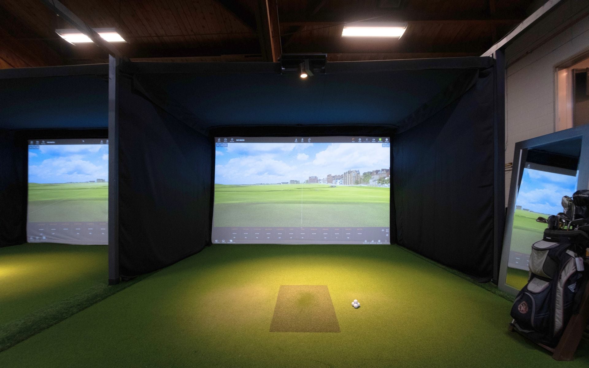 Indoor golf facility, multiple bays installed